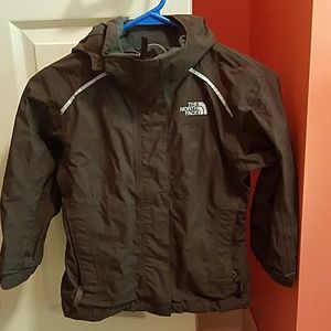 Girls Northface rain jacket, size XS.