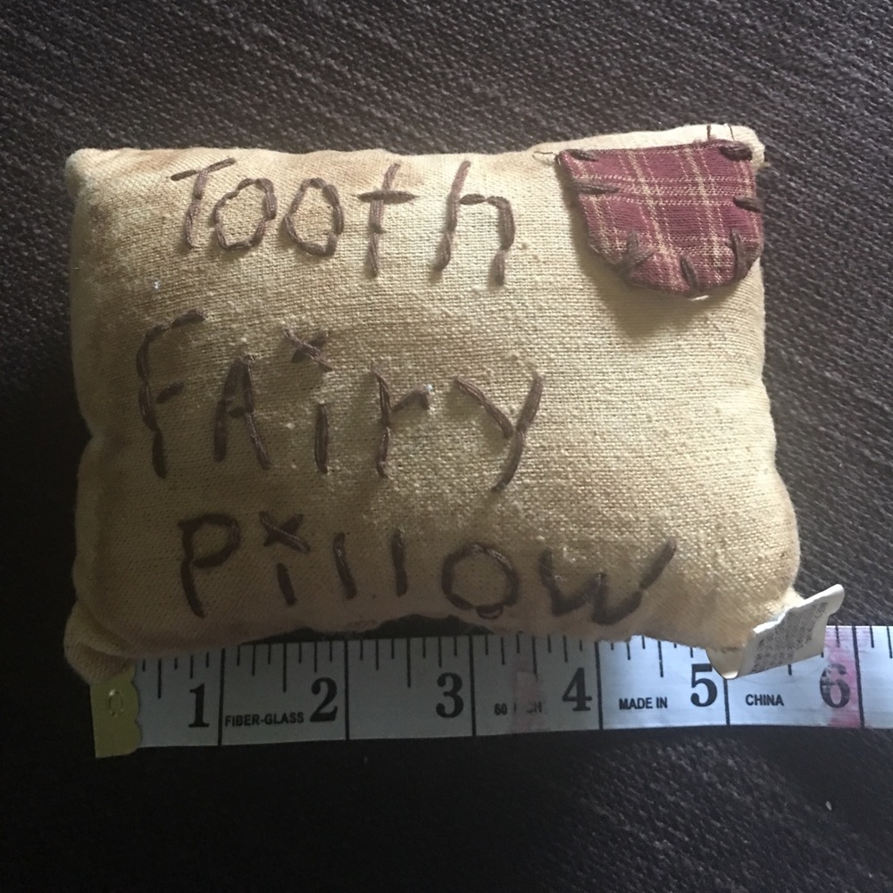 Primitive tooth fairy pillow.