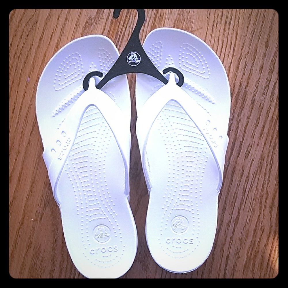 Brand new crocs flip flops