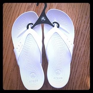 Brand new crocs flip flops