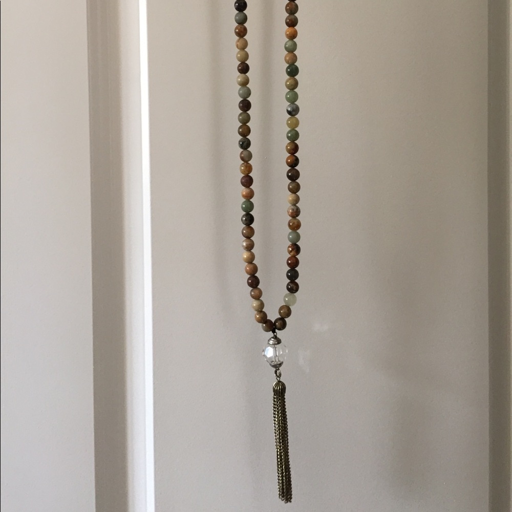 Long beaded necklace with tassel