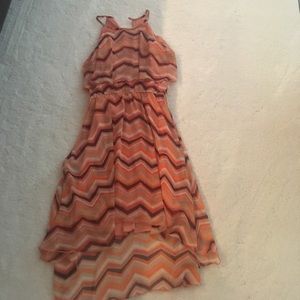 Orange and brown high low dress.