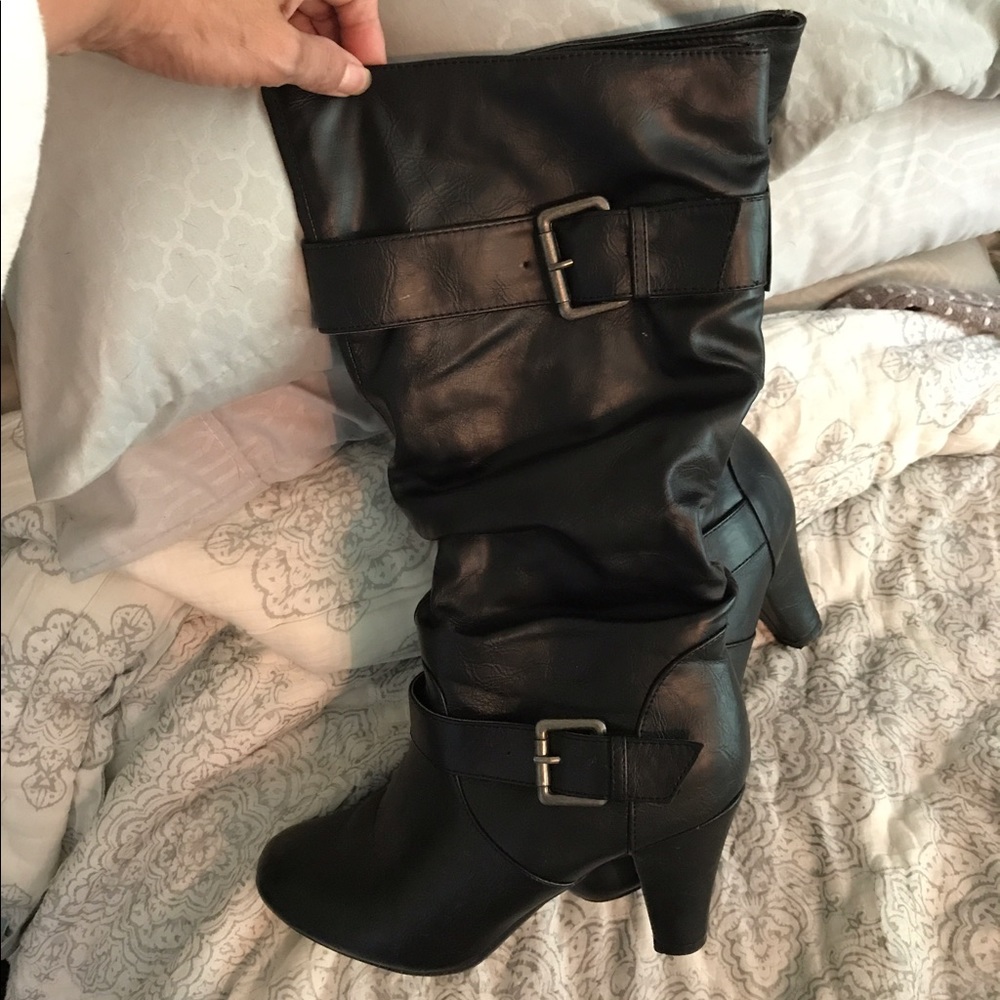 Black buckled boots
