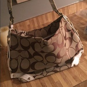 Brown and tan coach purse. Never been used