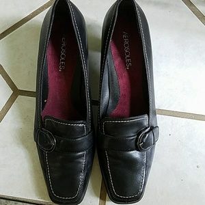 Black dress shoe.
