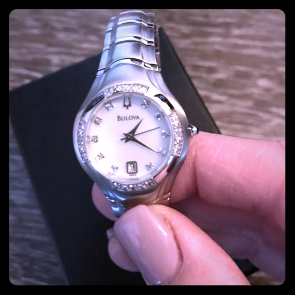 Silver Bulova, diamond setting watch!