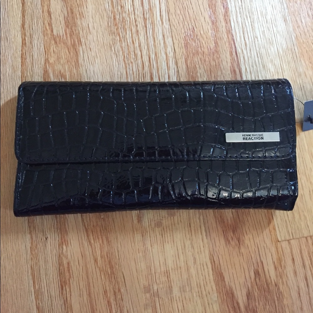 Kenneth Cole reaction clutch