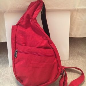 Baggallini  shoulder protecting backpack