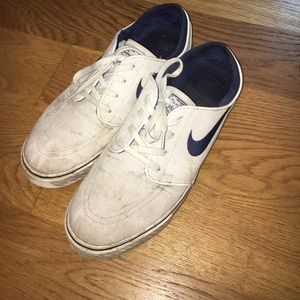 White nike stefan janoski skateboarding shoes.