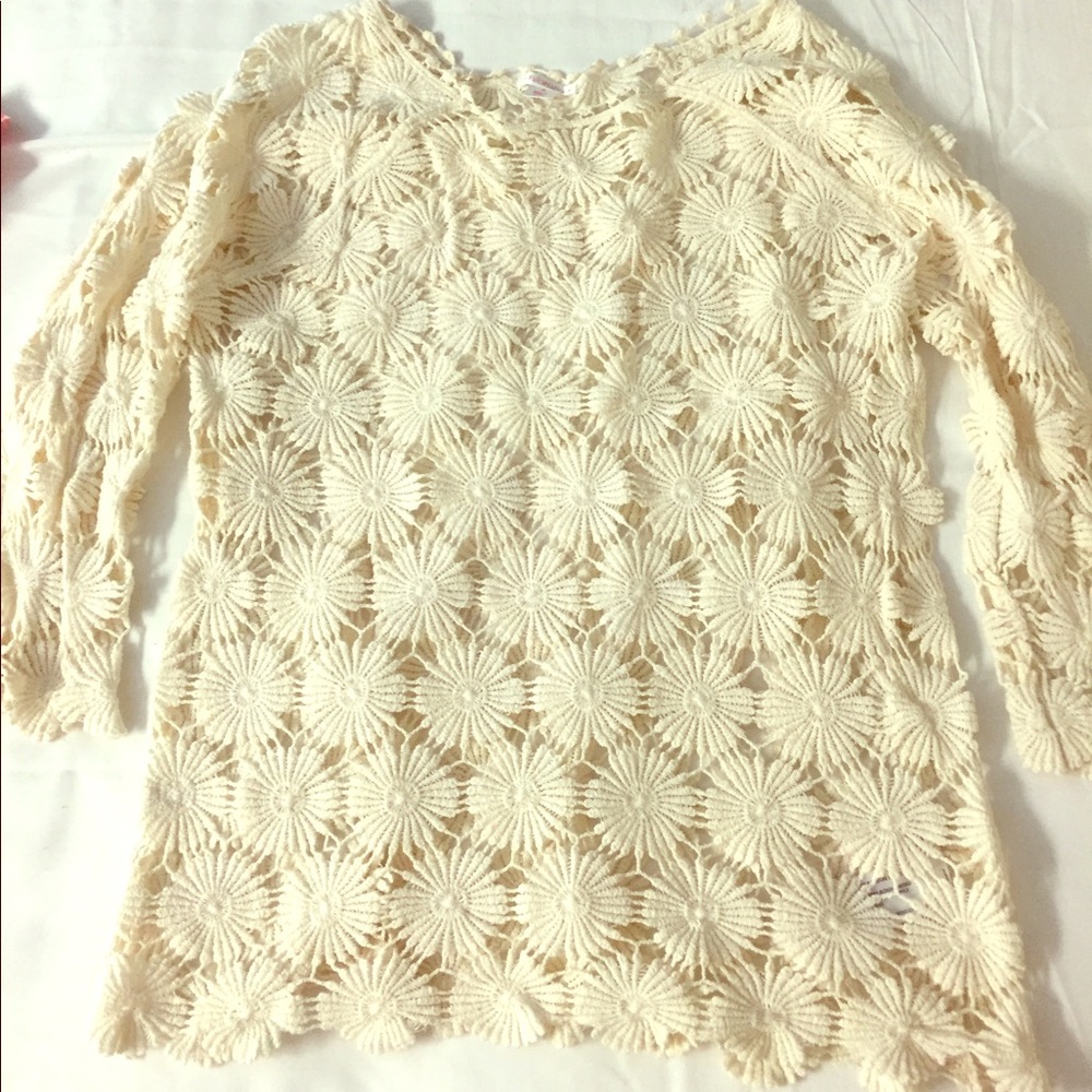 Floral lace shirt.