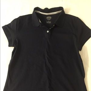 Navy polo shirt.
