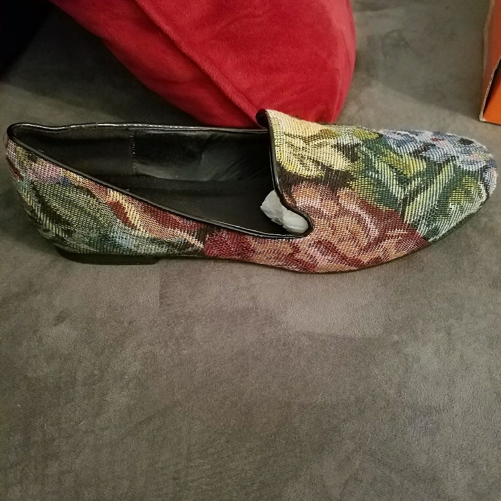 Black fabric flowered multi colored slip on flats