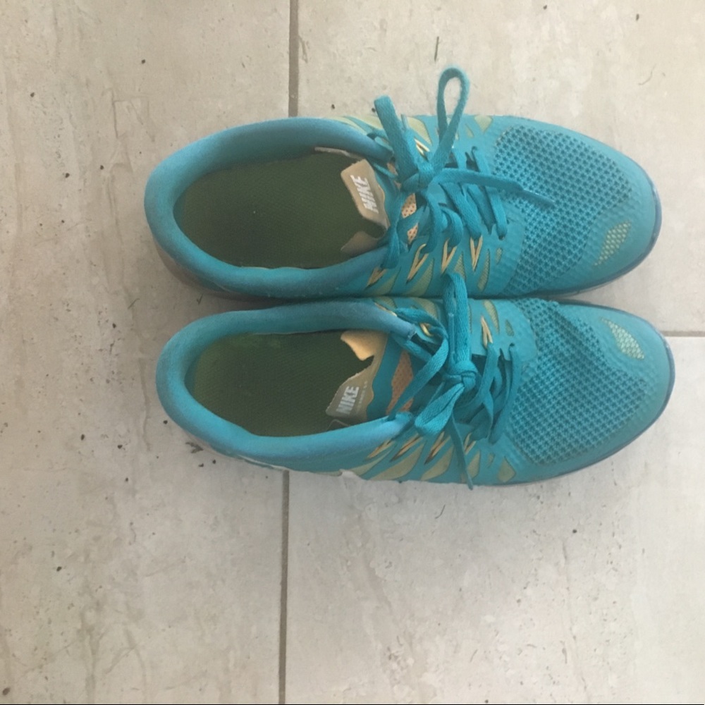 Blue and orange nikes