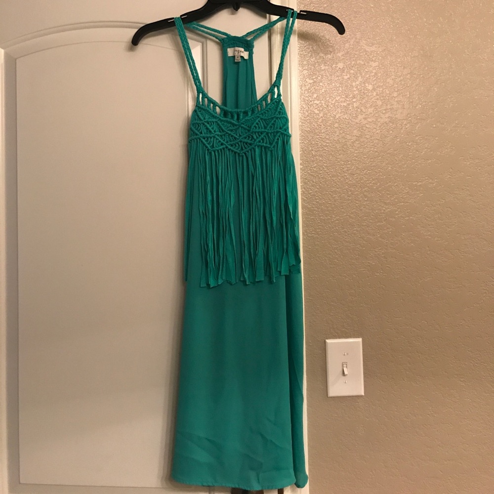 Turquoise dress with tassels