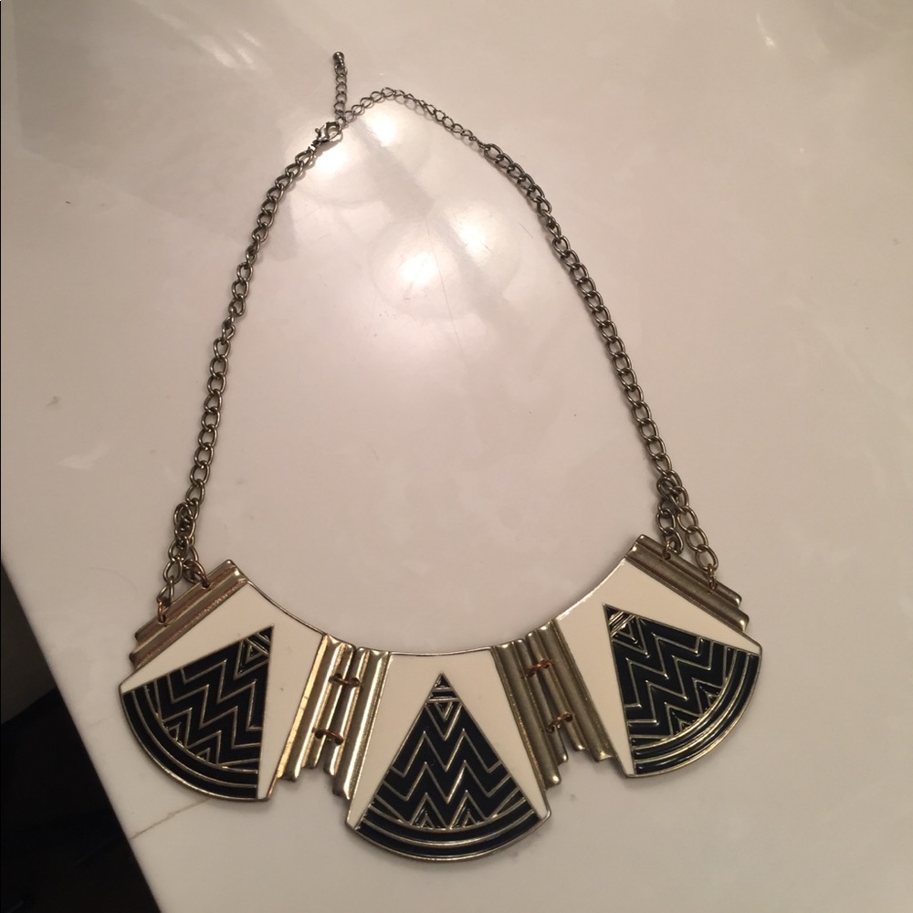 Gold, black, and white accent necklace