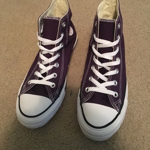 Purple high top converse all stars
