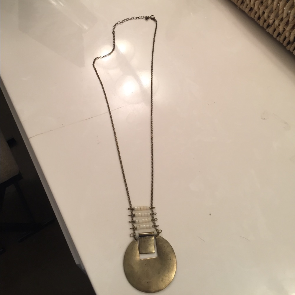 Gold pendent necklace with bead detail