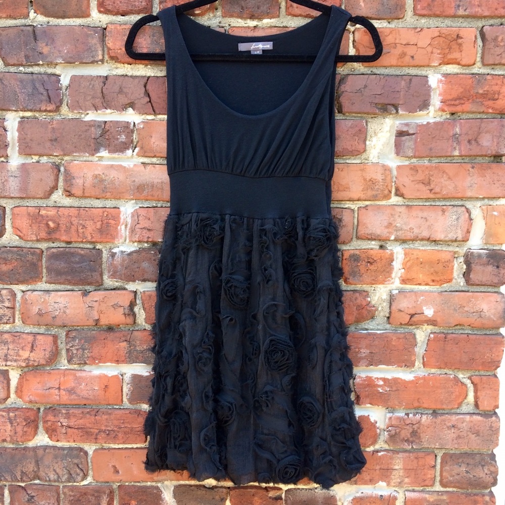 Black mini dress with textured floral skirt