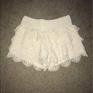 Cream ruffle shorts