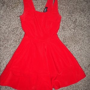 Tight-to-flowy red dress