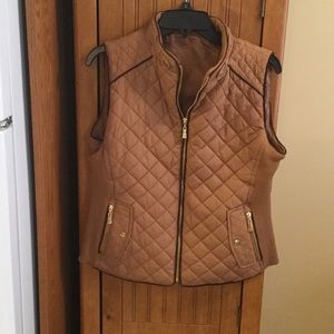 Boutique bought vest. Size L. Never worn.