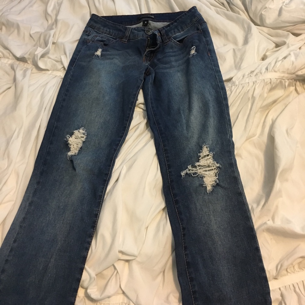 Aqua ripped blue jeans