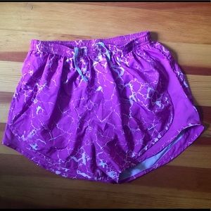 Purple Nike dri fit running shorts