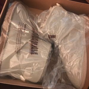 Brand new uggs still in box with plastic
