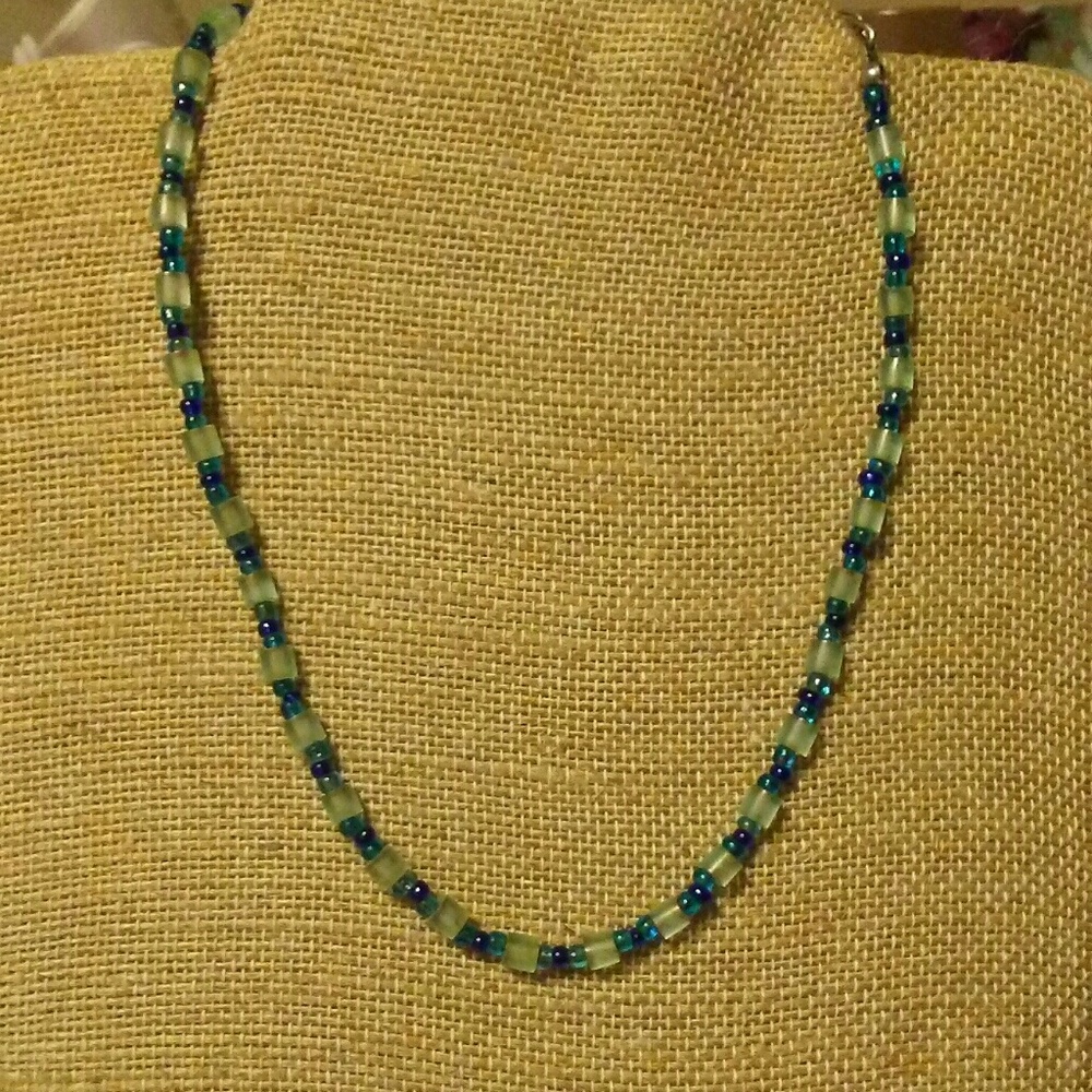 Necklace teal blue and frosted beads. 16 inches