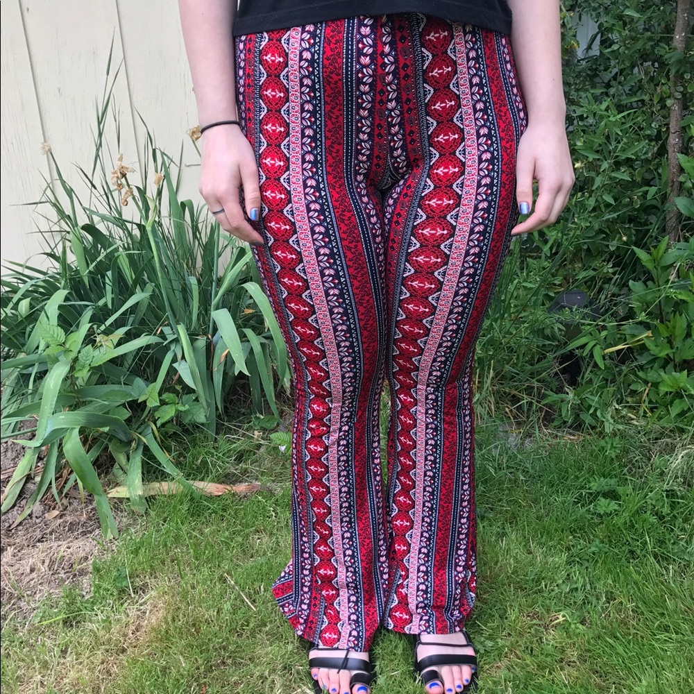 Red patterned flare stretch material pants