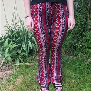 Red patterned flare stretch material pants
