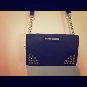 Black shoulder bag with chains