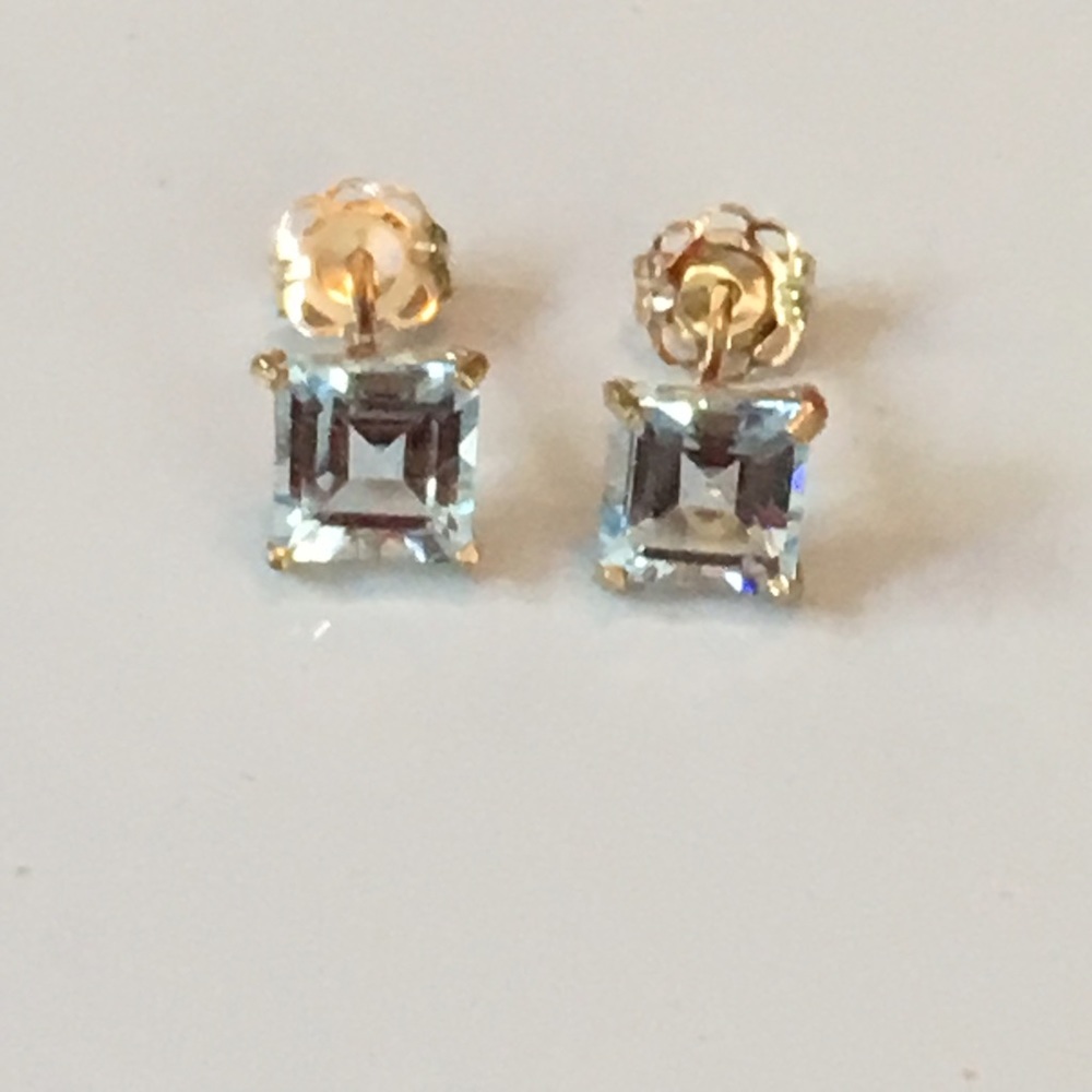Solid 10k yellow gold blue topaz stud earrings