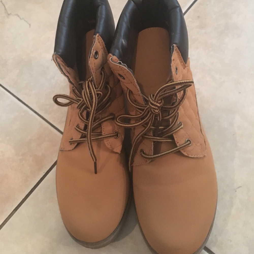 Tan lace up boots, slightly worn good condition.