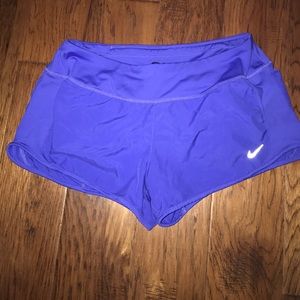 Purple Nike Dri-Fit shorts with liner