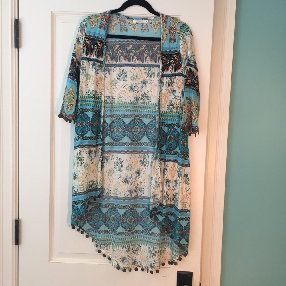 Light blue kimono with yellow and orange pattern