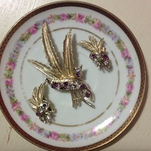 Vintage brooch with matching clip on earrings.