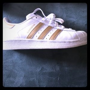 White and gold adidas superstar size 5.5