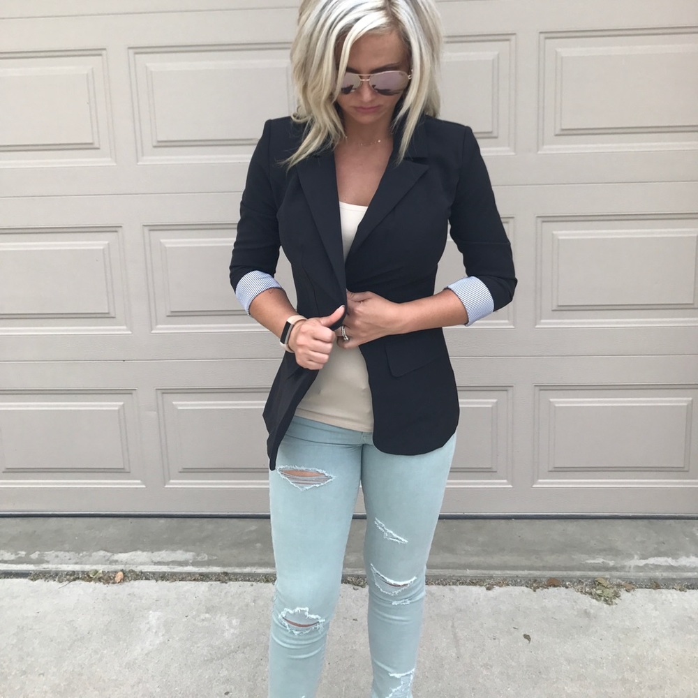 Size S, women's black blazer.