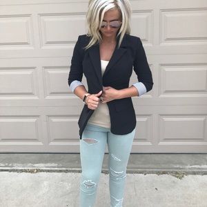 Size S, women's black blazer.