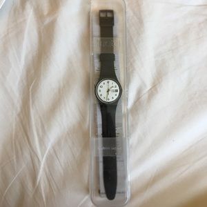 Brand new women's black swatch watch