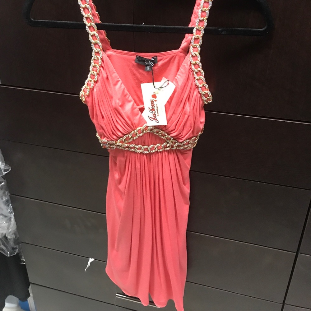 Peach sky chain mini dress.