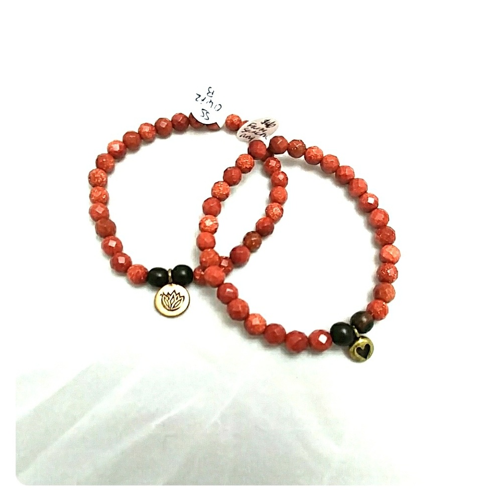 Beaded goldstone stretch bracelet w/ brass charm