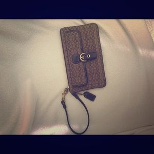 Small coach clutch or can be used as wallet