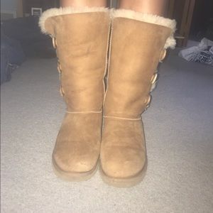Tall tan button UGGS