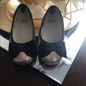 Metallic gold and black gap slip on's