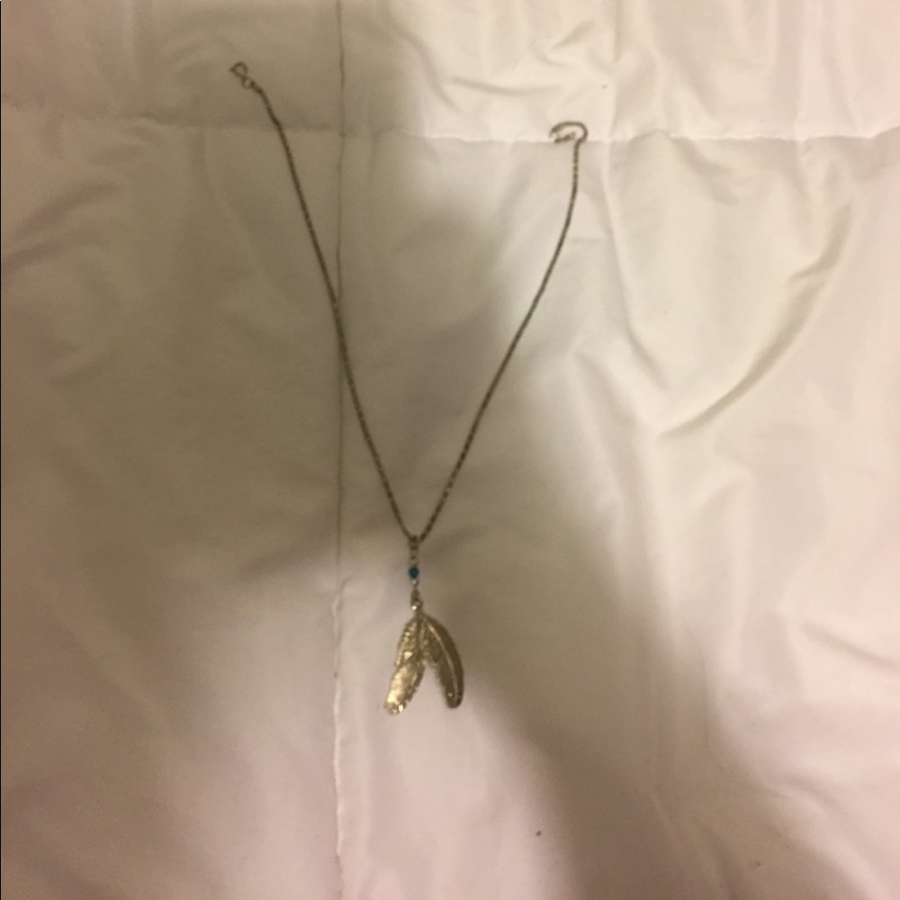 Silver feather necklace with blue bead