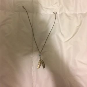 Silver feather necklace with blue bead