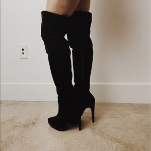 Over the knee heeled black boots