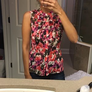 Limited sleeveless floral button down